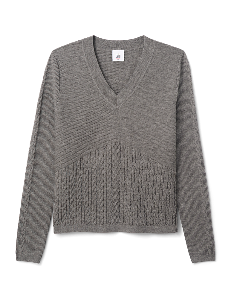 Gray sweater with cable knit pattern on a white background
