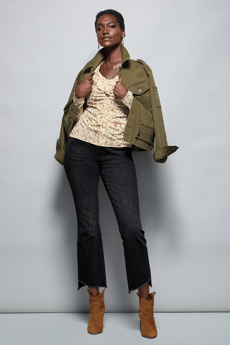 Model Wearing Evans Jacket in Olive, Dapple Top in Static Print, High-Low Crop in Washed Black, Fable Earrings in Gold, Fable Necklace in Gold.