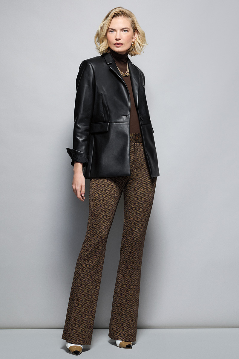 Model Wearing James Jacket in Black, Slinky Turtleneck in Dark Chocolate, Director Trouser in Multi, Dream Earrings in Gold, Dream Weaver Necklace in Gold.