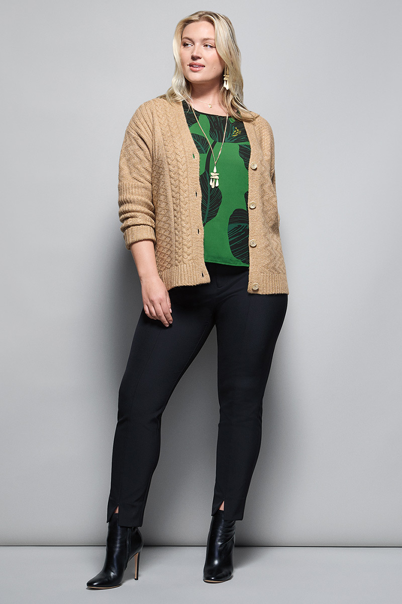 Model Wearing Neighbor Cardigan in Heather Camel, Tahiti Top in Black Floral, Keynote Trouser in Black, Chime Earrings in Gold, Chime Necklace in Gold.