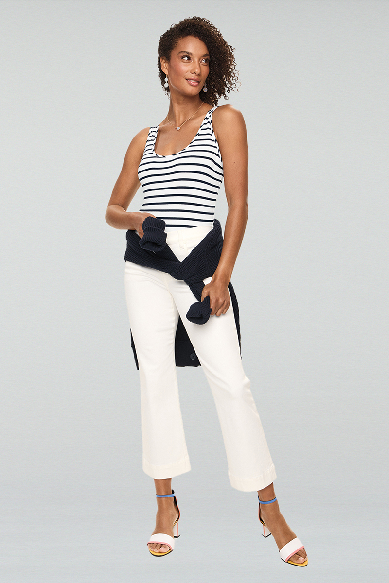 Model Wearing Textbook Cardigan in Classic Navy, Striped Charm Tank in Navy Stripe, Palm Beach Crop in White, Misty Earrings in Gold, Misty Necklace in Gold