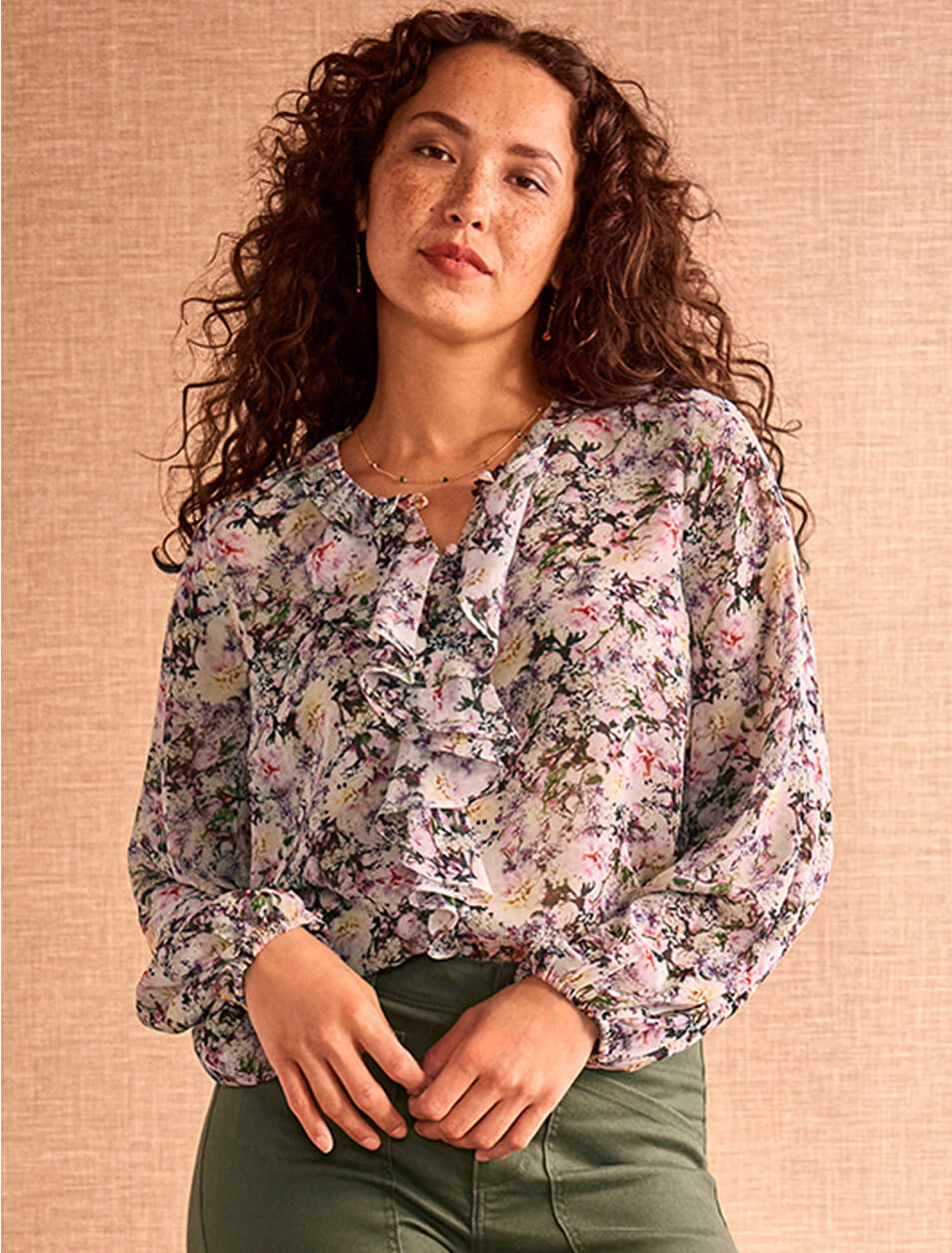 a model wearing items from cabi's Fall 2025 Collection against a linen backdrop