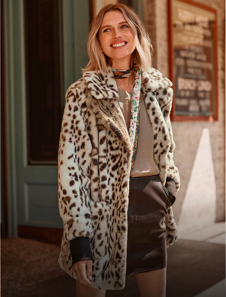 A model wearing the Leopard Coat from the Fall 2025 Collection