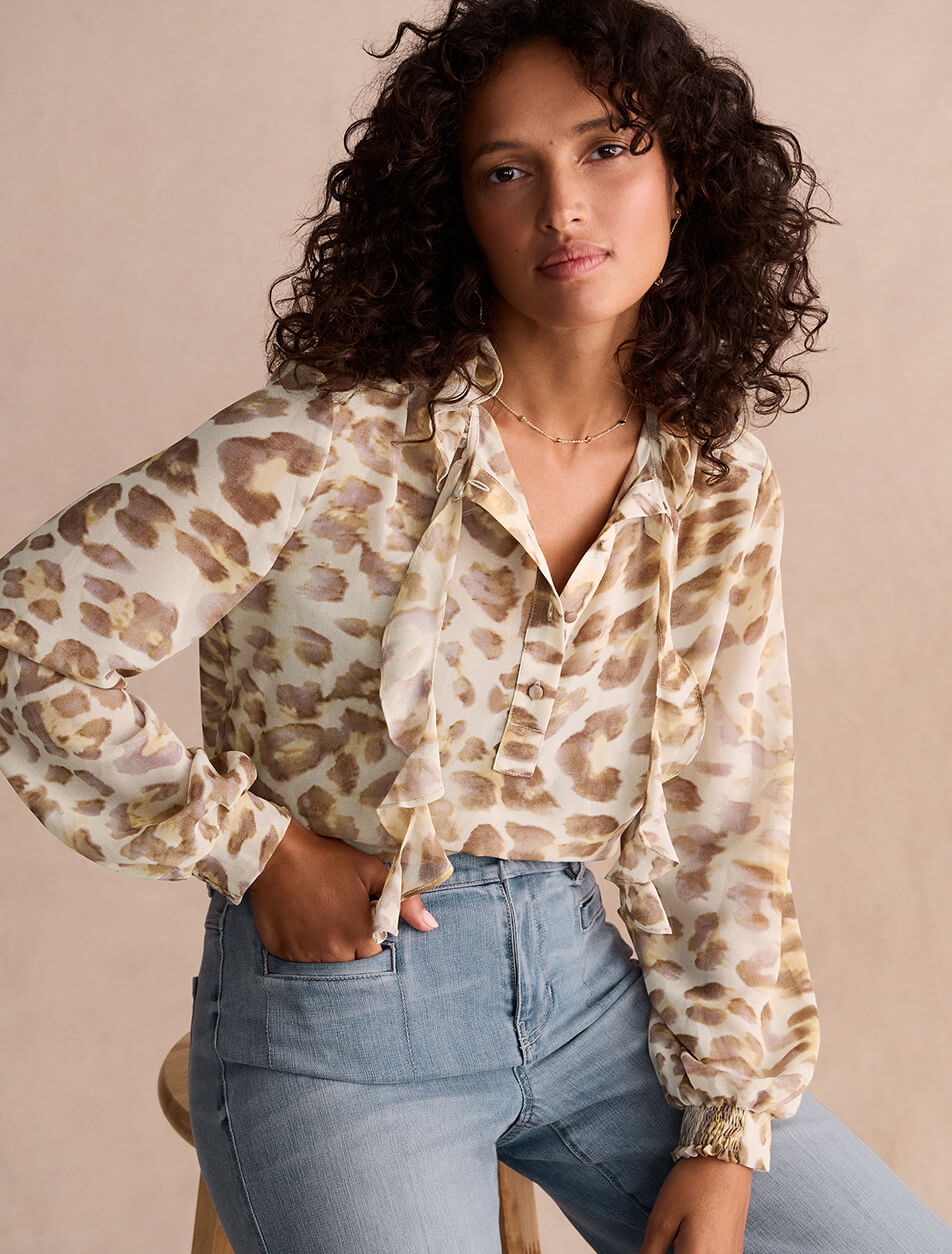 A model wearing items from the cabi's Fall New Arrivals collection