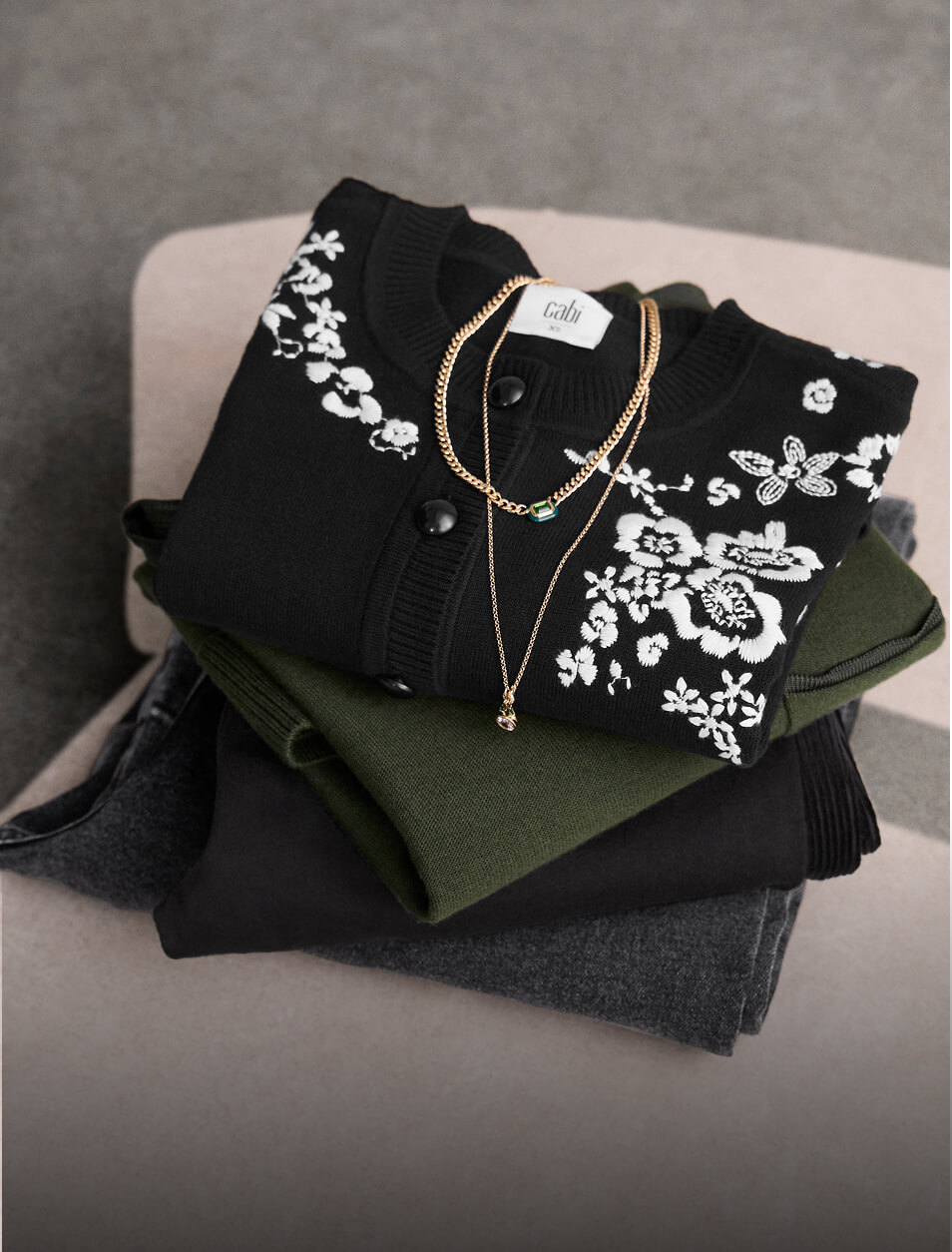 folded clothing items on display